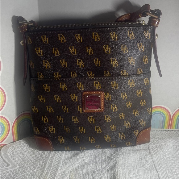 Dooney & Bourke Handbags - Dooney & Bourke Black and Gold Monogram Shoulder Bag